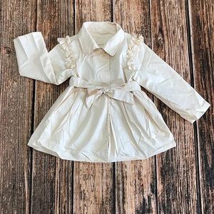 Little girl ruffles jacket